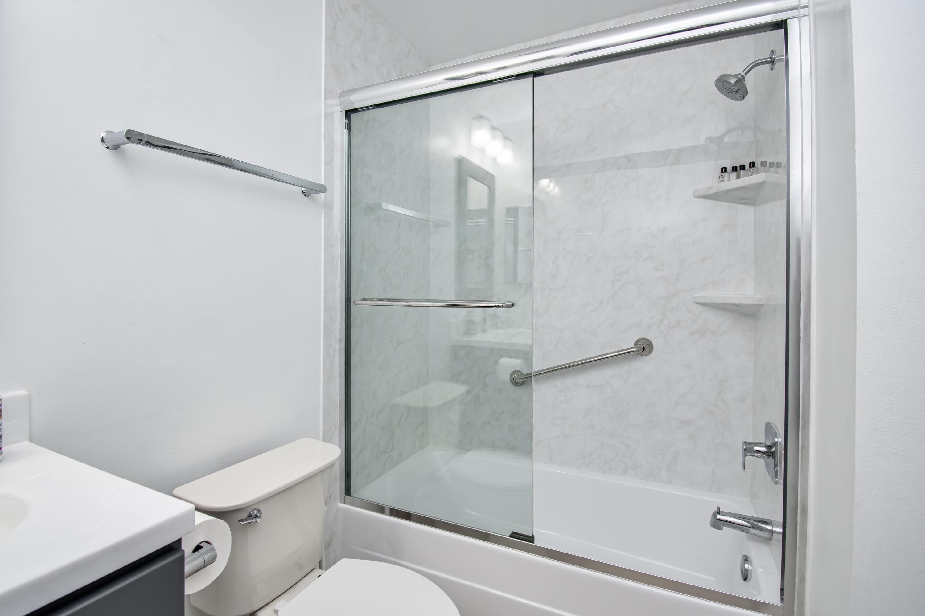 6825 Bridlewood Court Boca Raton, FL 33433 - Photo 24 of 31 a bathroom with a shower and a toilet