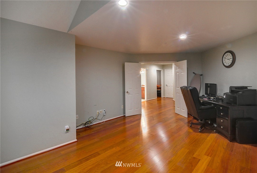 1217 South 36th Place Renton, WA 98055 - Photo 24 of 30 a view of workspace with wooden floor and windows