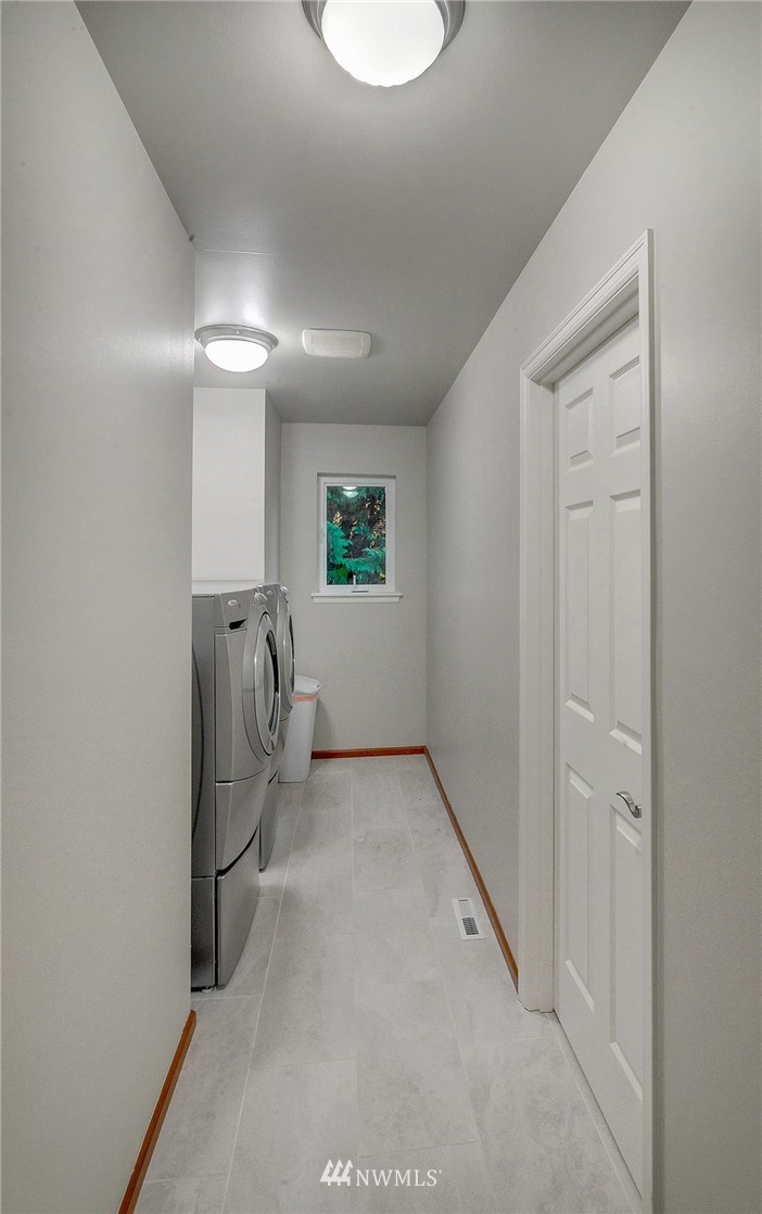 1217 South 36th Place Renton, WA 98055 - Photo 29 of 30 a view of a hallway with a closet