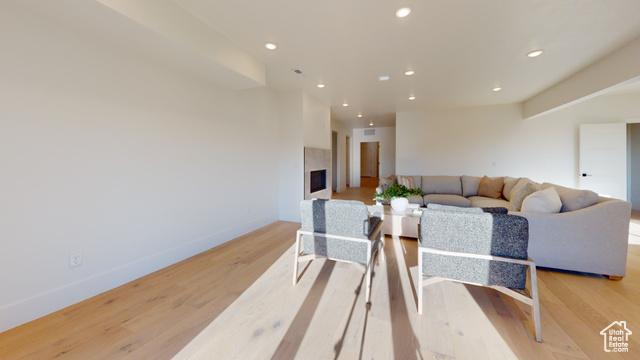 683 North Heritage Street Mapleton, UT 84664 - Photo 35 of 40 Living room with recessed lighting, light wood-type flooring, and a premium fireplace