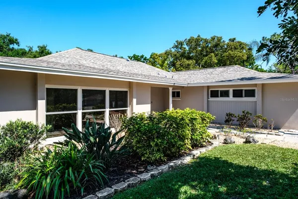 a kitchen with granite countertop counter top space a sink stainless steel appliances and cabinets