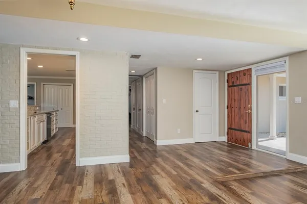 a room with furniture and a flat screen tv