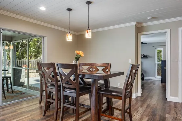 a white bath tub sitting next to a white toilet