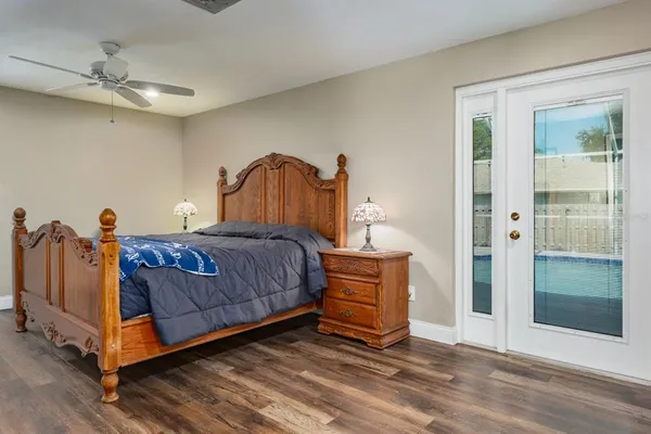 a view of a patio with couches chairs and potted plants