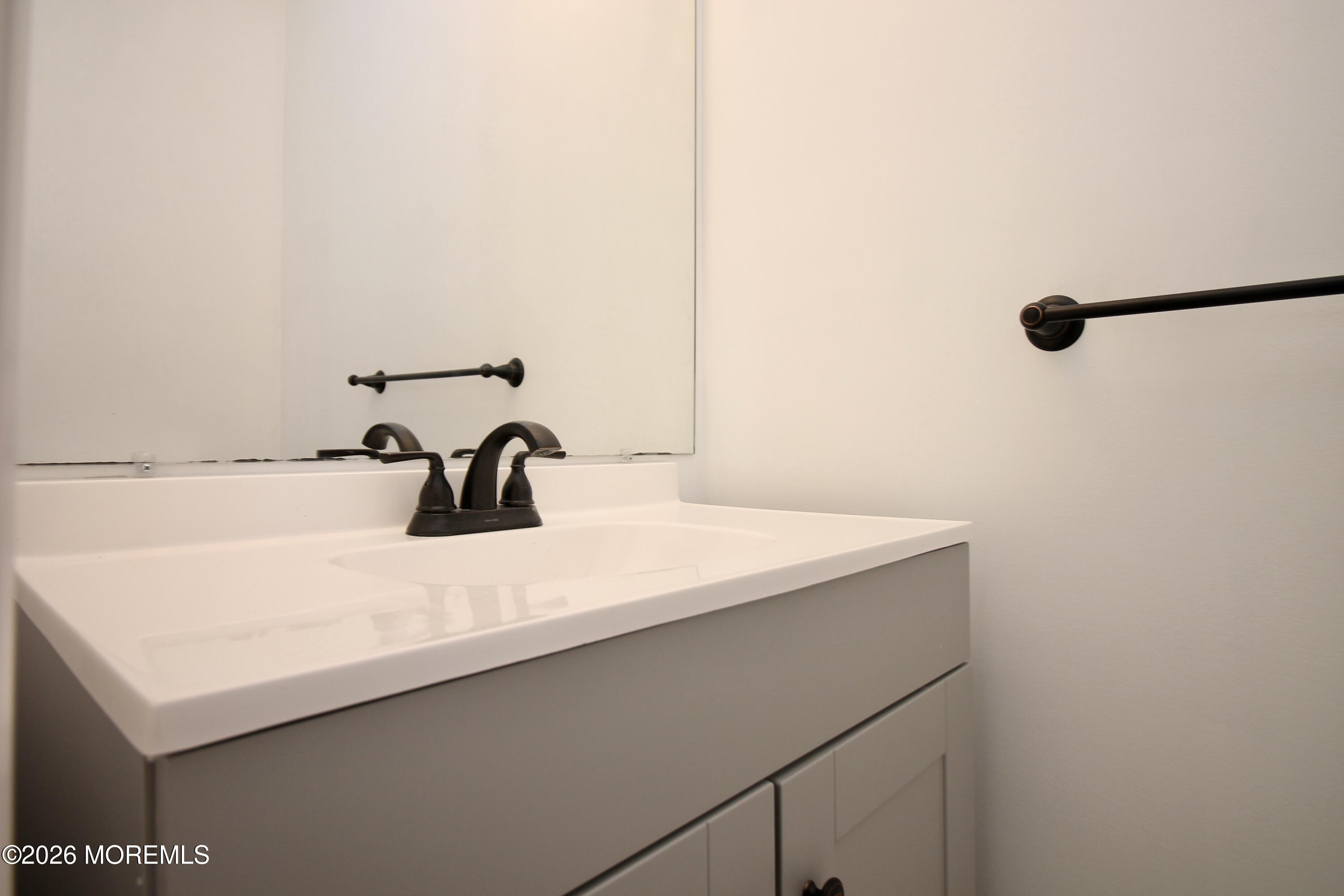 5-2 Claridge Court, Unit 2 Freehold, NJ 07728 - Photo 22 of 35 a close up of a sink