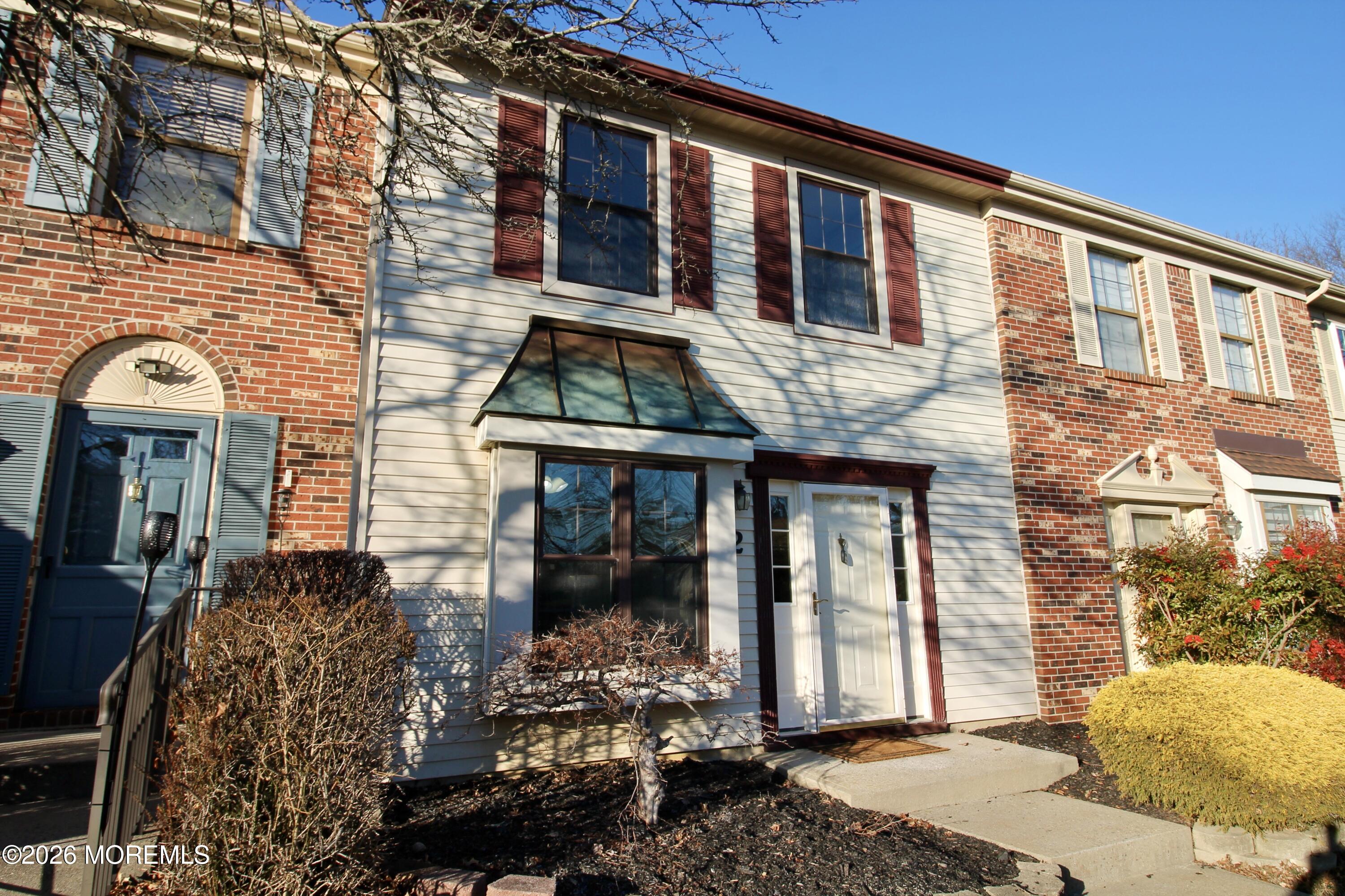 5-2 Claridge Court, Unit 2 Freehold, NJ 07728 - Photo 3 of 35 a front view of a house