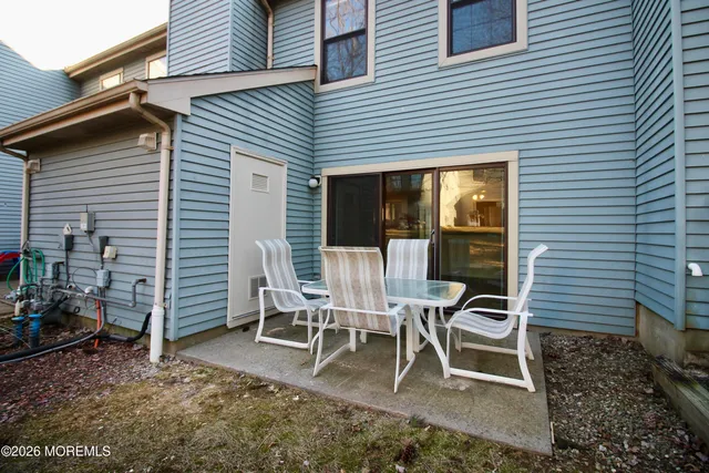 a lawn chair sitting in front of a house