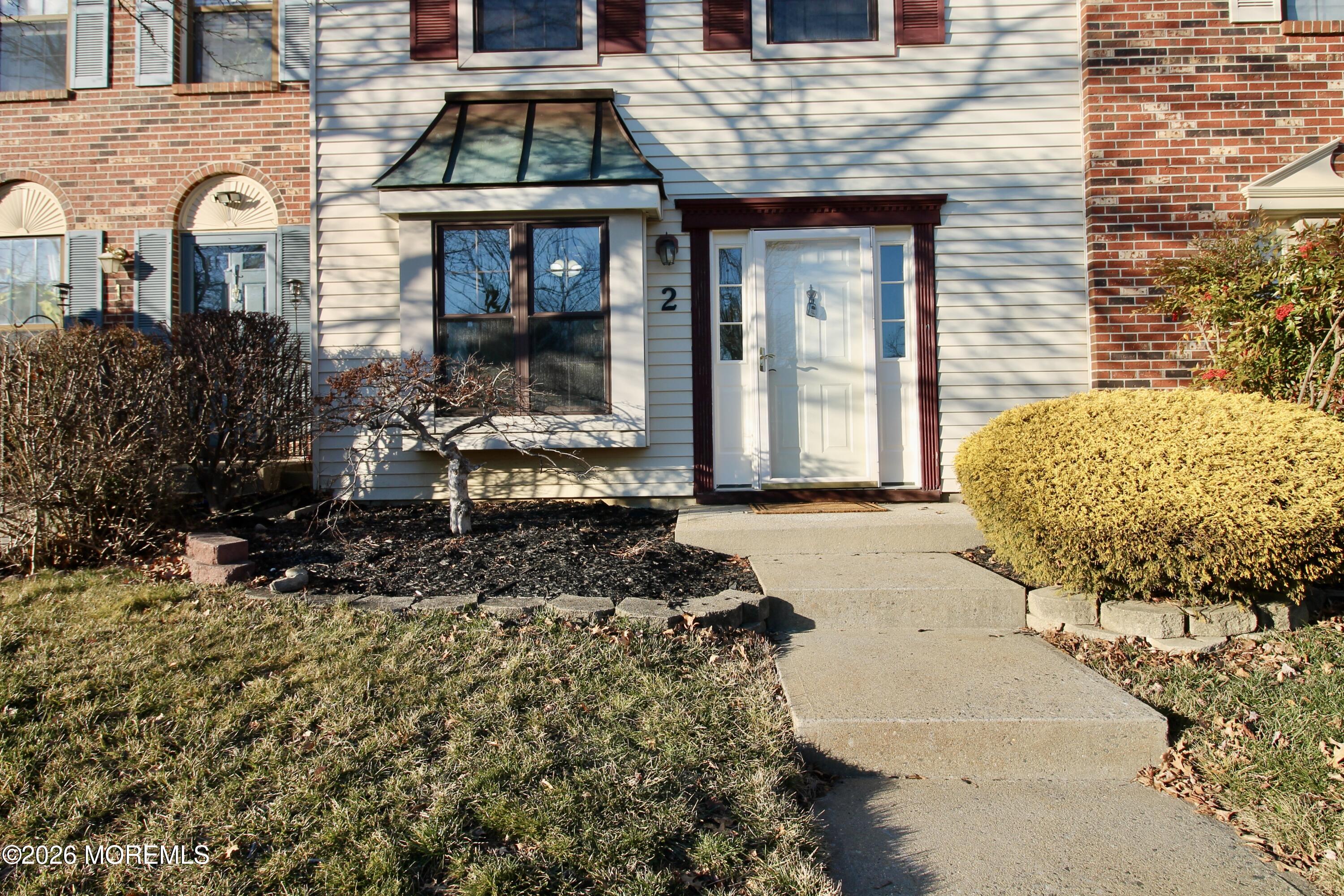 5-2 Claridge Court, Unit 2 Freehold, NJ 07728 - Photo 4 of 35 a front view of a house
