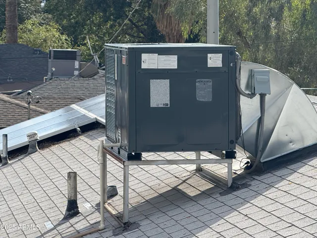 a view of balcony with wooden floor and fence