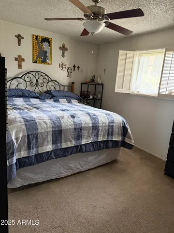 a bathroom with a toilet and a sink