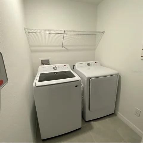 a view of hallway with shower