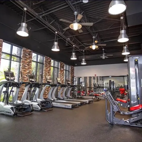 swimming pool view with a garden