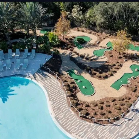 a view of a swimming pool from a balcony