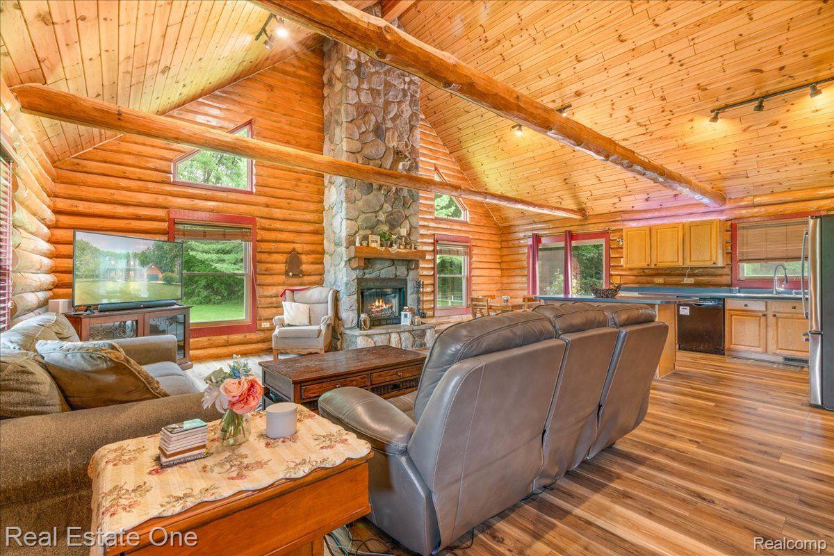 7596 Fisher Road Howell, MI 48855 - Photo 11 of 41 Floor to Ceiling Stone Fireplace