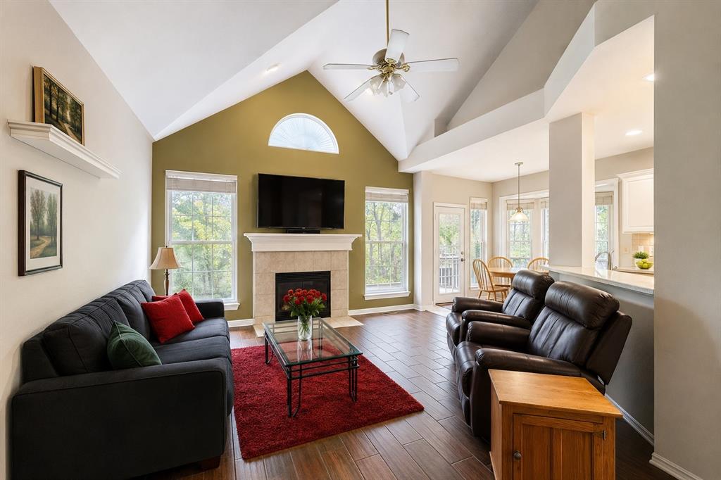1508 Valley Creek Road Denton, TX 76205 - Photo 6 of 33 a living room with furniture fireplace and flat screen tv