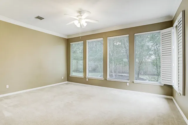 a bathroom with a bath tub and shower