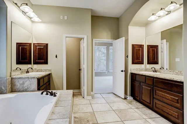 a view of walk in closet with window