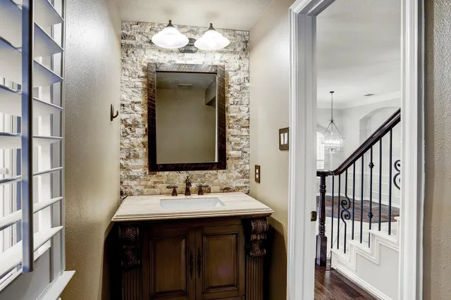 a view of storage and utility room with window