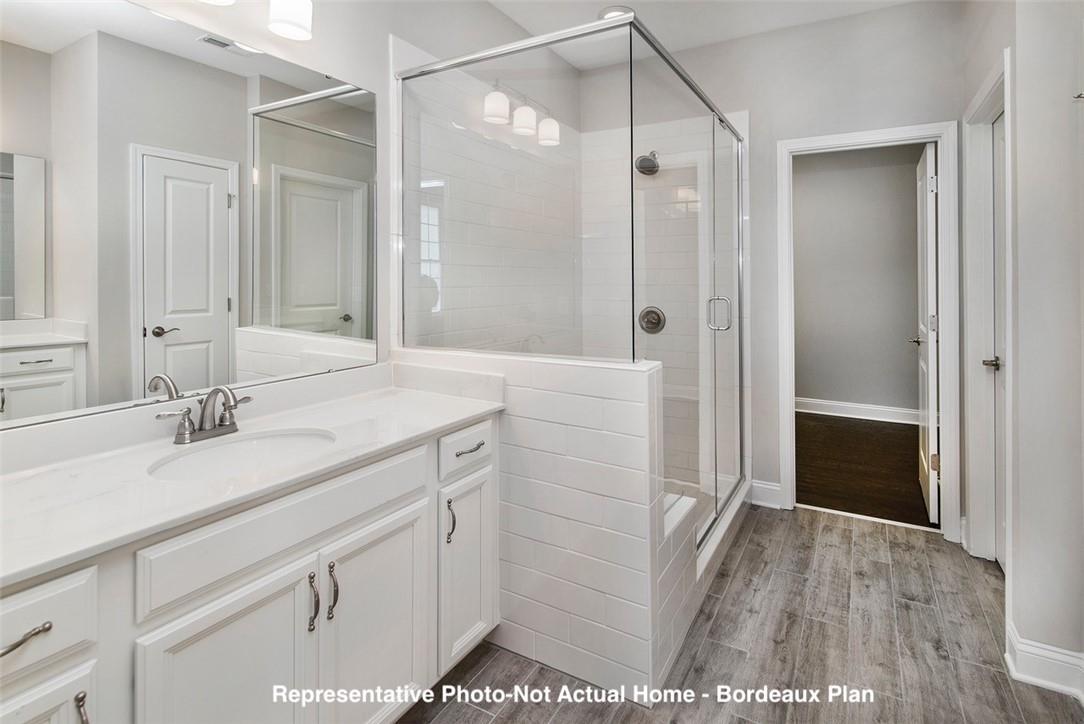 10175 Rainier Trail Drive Northwest Huntersville, NC 28078 - Photo 12 of 18 a bathroom with a sink and a mirror