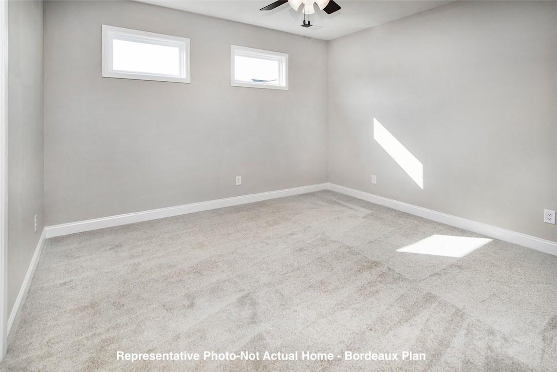 10175 Rainier Trail Drive Northwest Huntersville, NC 28078 - Photo 14 of 18 a view of an empty room with a window