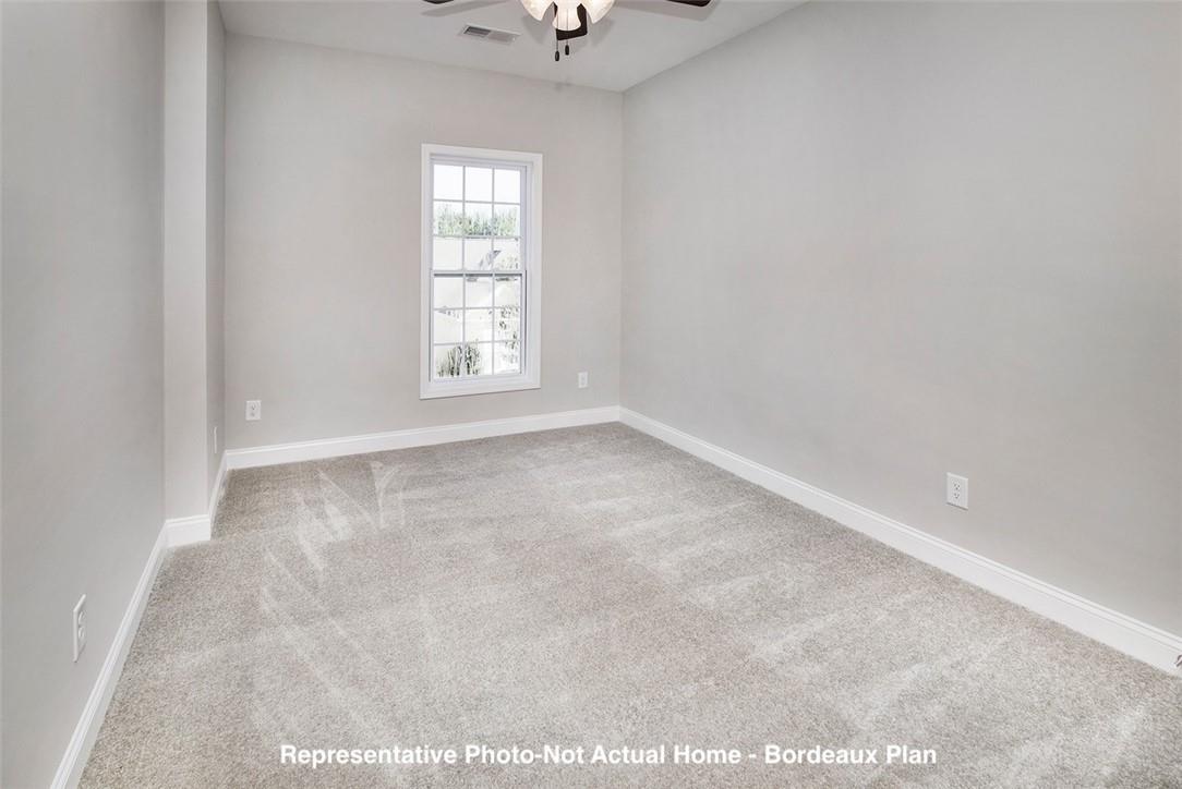 10175 Rainier Trail Drive Northwest Huntersville, NC 28078 - Photo 17 of 18 an empty room with a window