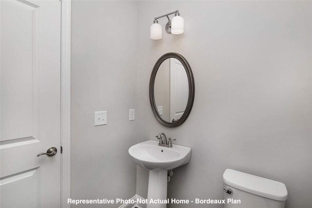 10175 Rainier Trail Drive Northwest Huntersville, NC 28078 - Photo 7 of 18 a bathroom with a sink and a mirror