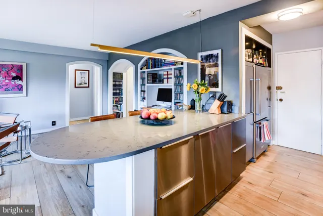 a kitchen with kitchen island granite countertop lots of counter top space