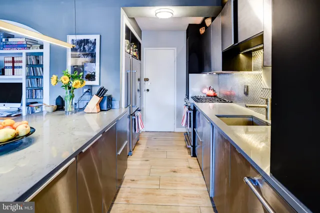 a room with furniture and a flat screen tv