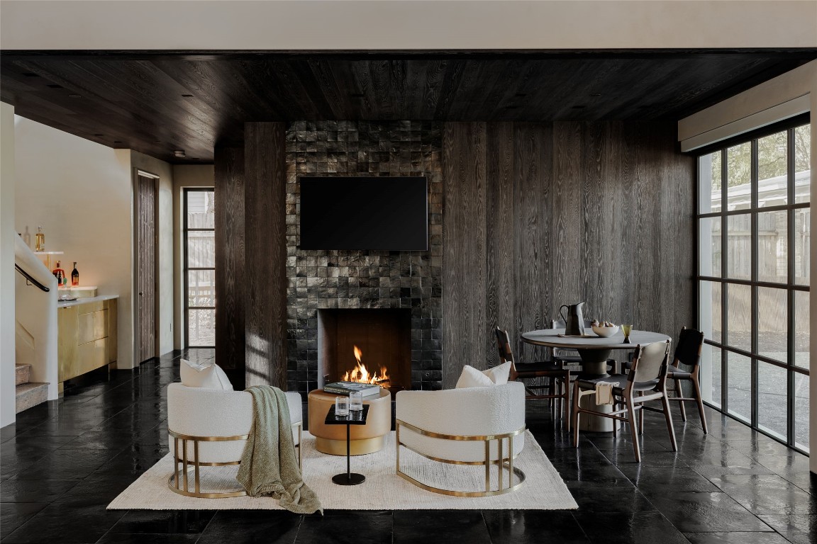 2600 Tanglewood Trail Austin, TX 78703 - Photo 13 of 35 a living room with furniture a fireplace and a table