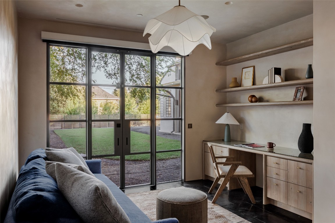 2600 Tanglewood Trail Austin, TX 78703 - Photo 15 of 35 a view of a livingroom with workspace and a window
