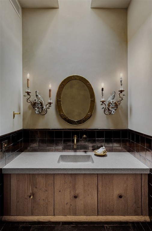 2600 Tanglewood Trail Austin, TX 78703 - Photo 16 of 35 a bathroom with a sink and a mirror