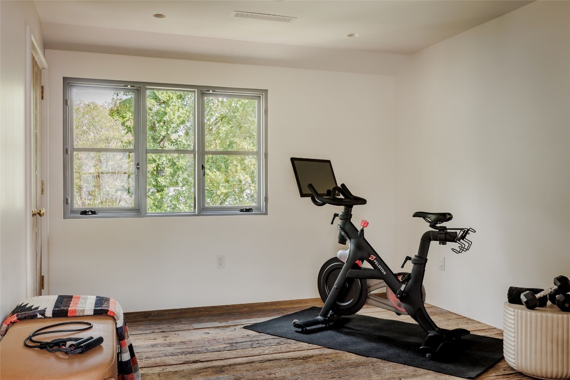 2600 Tanglewood Trail Austin, TX 78703 - Photo 23 of 35 a view of a room with gym equipment