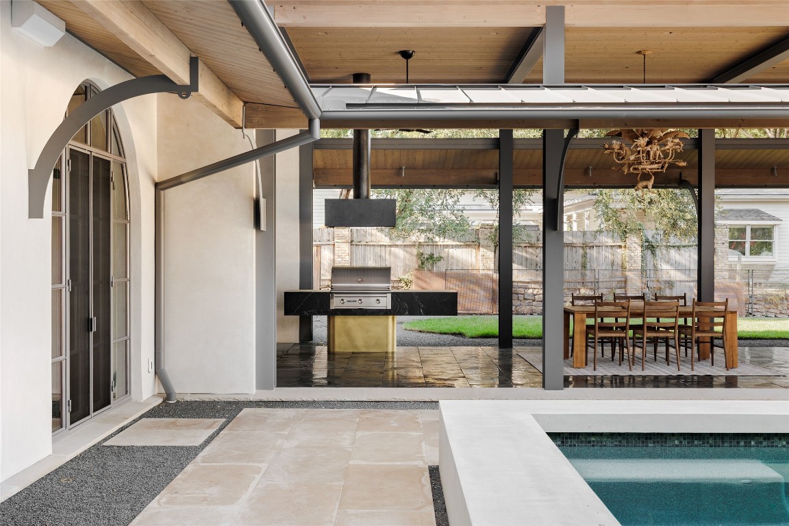 2600 Tanglewood Trail Austin, TX 78703 - Photo 30 of 35 a view of living room with furniture and floor to ceiling window