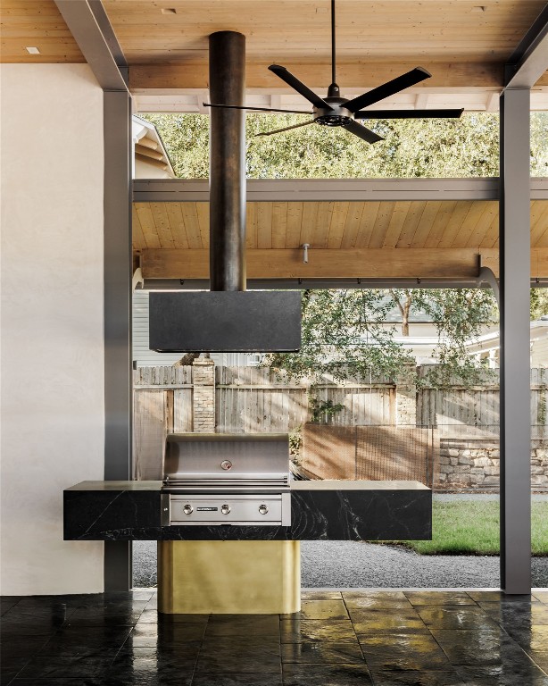 2600 Tanglewood Trail Austin, TX 78703 - Photo 31 of 35 a view of a living room with a floor to ceiling window and wooden floor