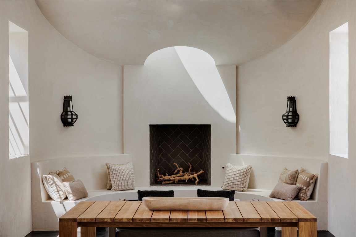 2600 Tanglewood Trail Austin, TX 78703 - Photo 34 of 35 a living room with furniture and a fireplace