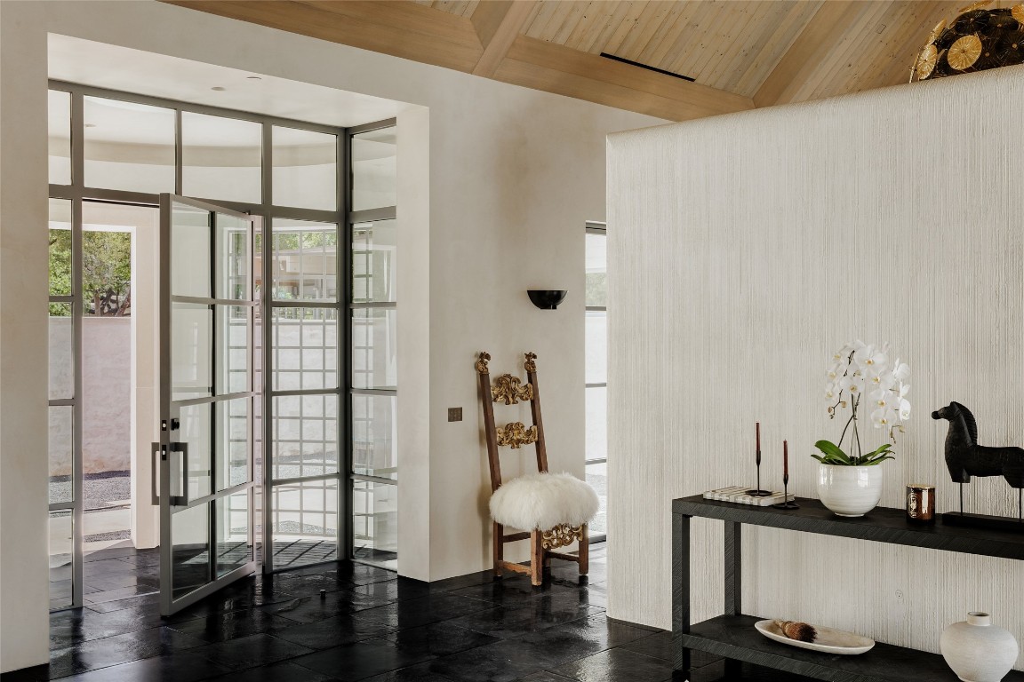 2600 Tanglewood Trail Austin, TX 78703 - Photo 4 of 35 a view of a workspace with furniture and wooden floor