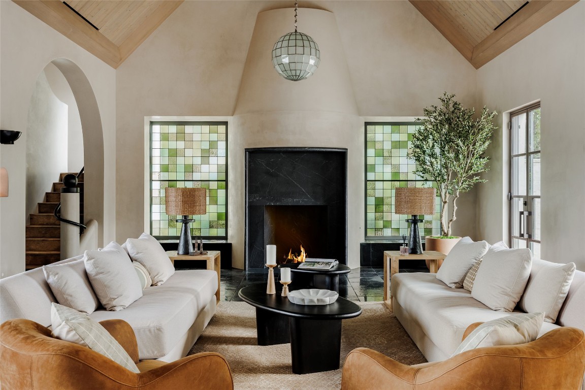2600 Tanglewood Trail Austin, TX 78703 - Photo 6 of 35 a living room with furniture and a fireplace