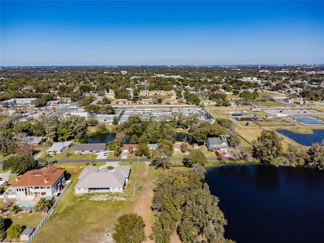 an aerial view of a city with lots of residential buildings
