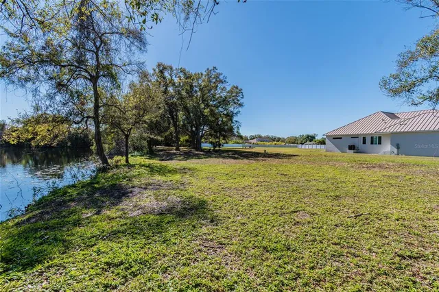 a view of a large body of water with water fall