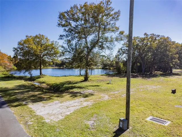 a view of a swimming pool with an outdoor space