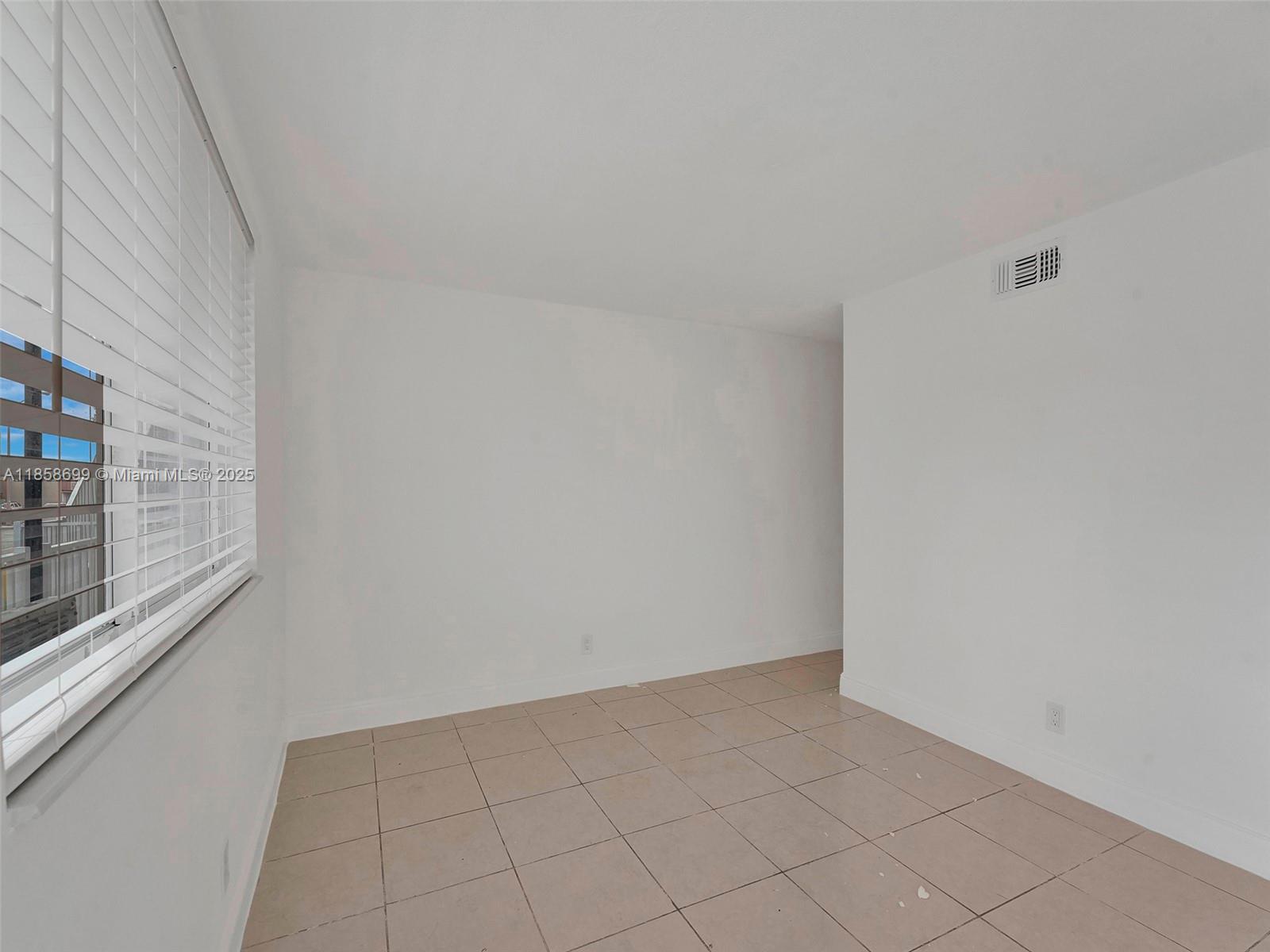 14190 West Dixie Highway, Unit 11 North Miami, FL 33161 - Photo 14 of 21 a view of an empty room