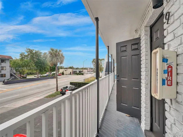 a view of a street from a balcony