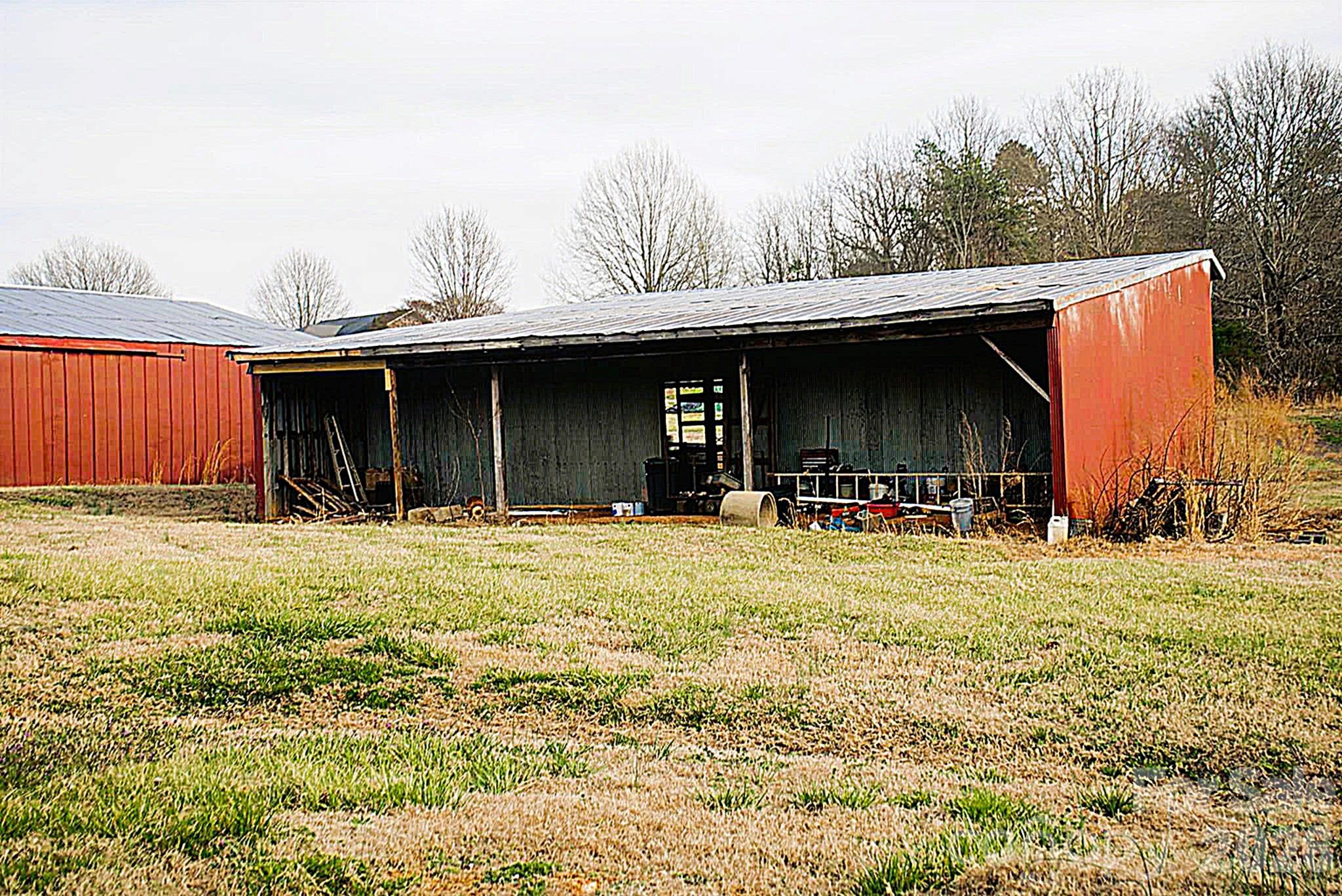 6581 Sain Milling Road Vale, NC 28168 - Photo 21 of 41 a backyard of a house with table and chairs