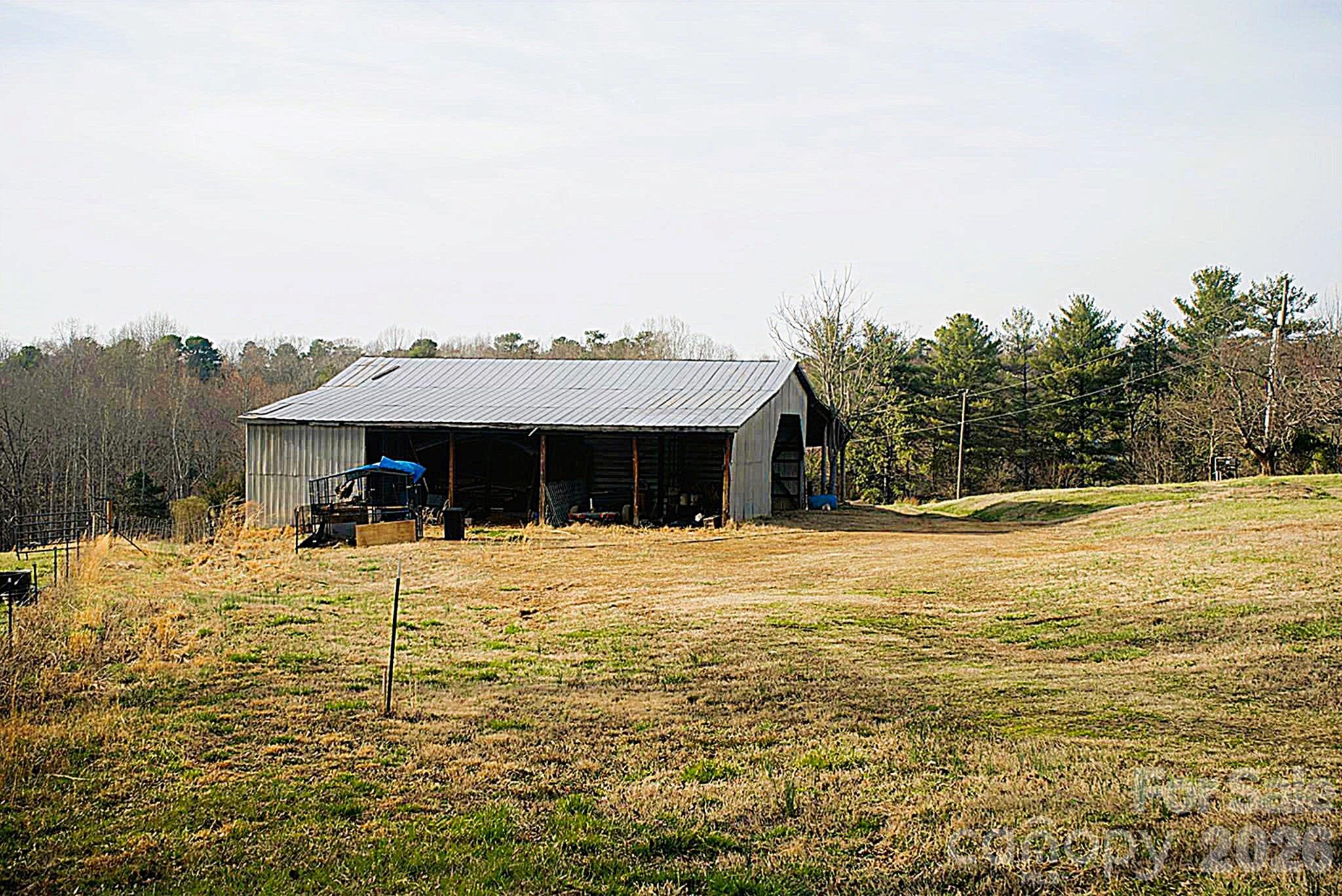 6581 Sain Milling Road Vale, NC 28168 - Photo 26 of 41 a view of a house with a yard
