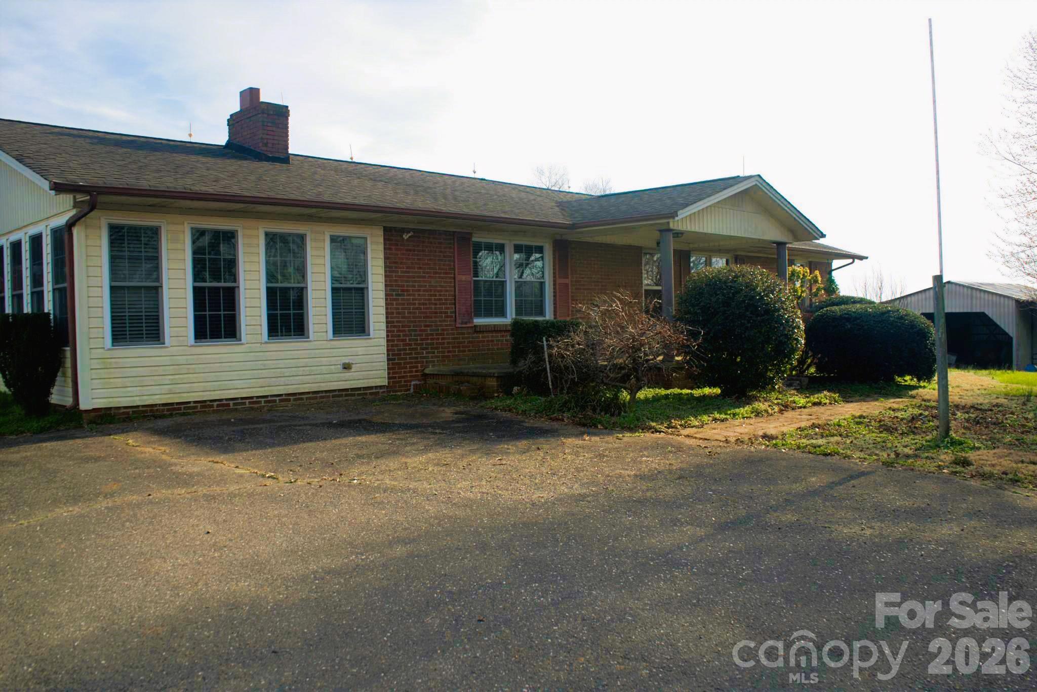6581 Sain Milling Road Vale, NC 28168 - Photo 29 of 41 a front view of a house with a yard
