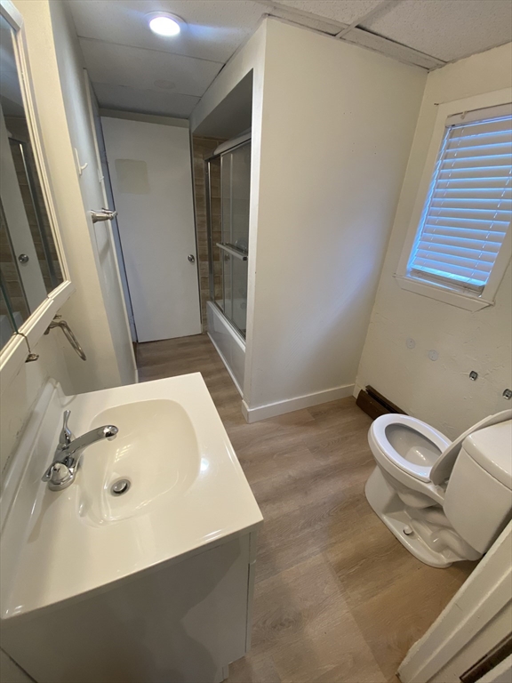 51 School Street, Unit 1 Boston, MA 02129 - Photo 8 of 11 a bathroom with a sink a toilet and shower