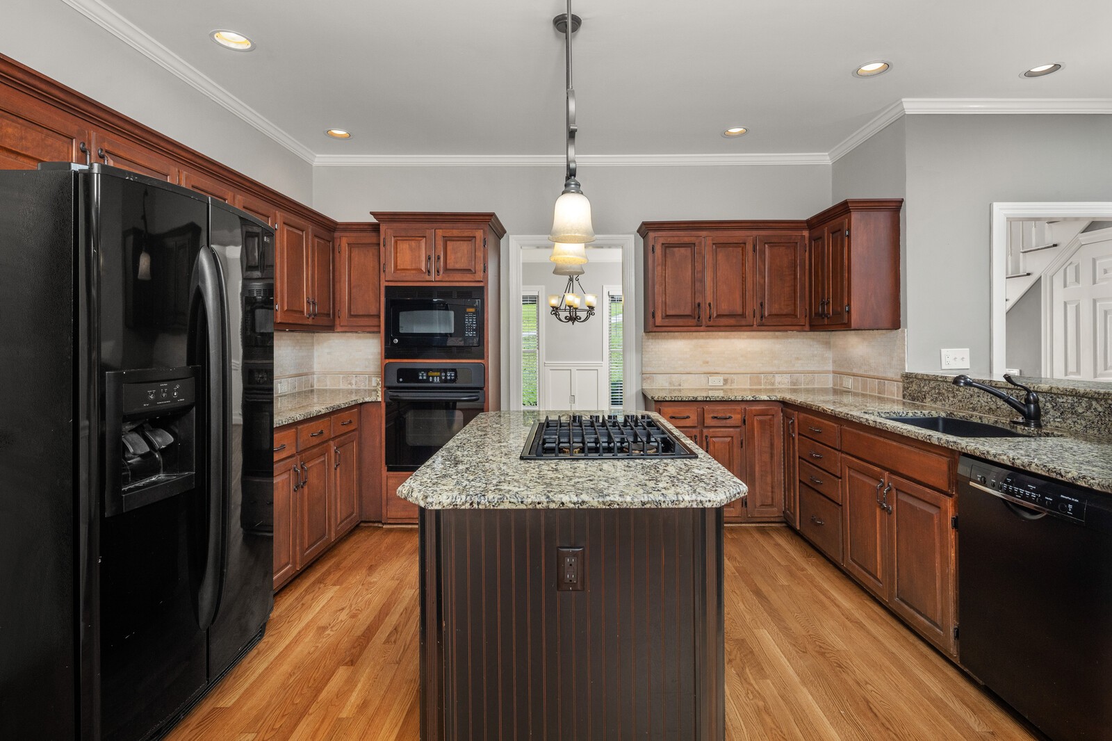 341 Sandcastle Road Franklin, TN 37069 - Photo 14 of 41 a kitchen with stainless steel appliances granite countertop counter space a refrigerator and cabinets