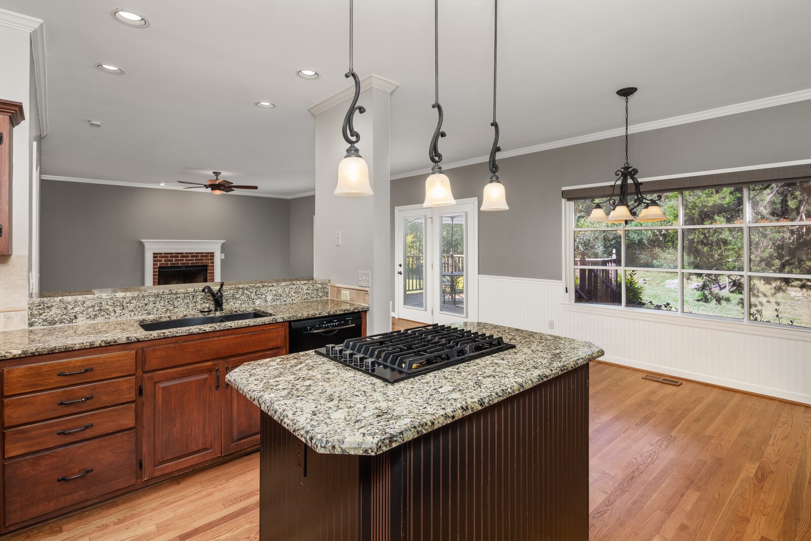 341 Sandcastle Road Franklin, TN 37069 - Photo 16 of 41 a kitchen with a stove and a wooden floor