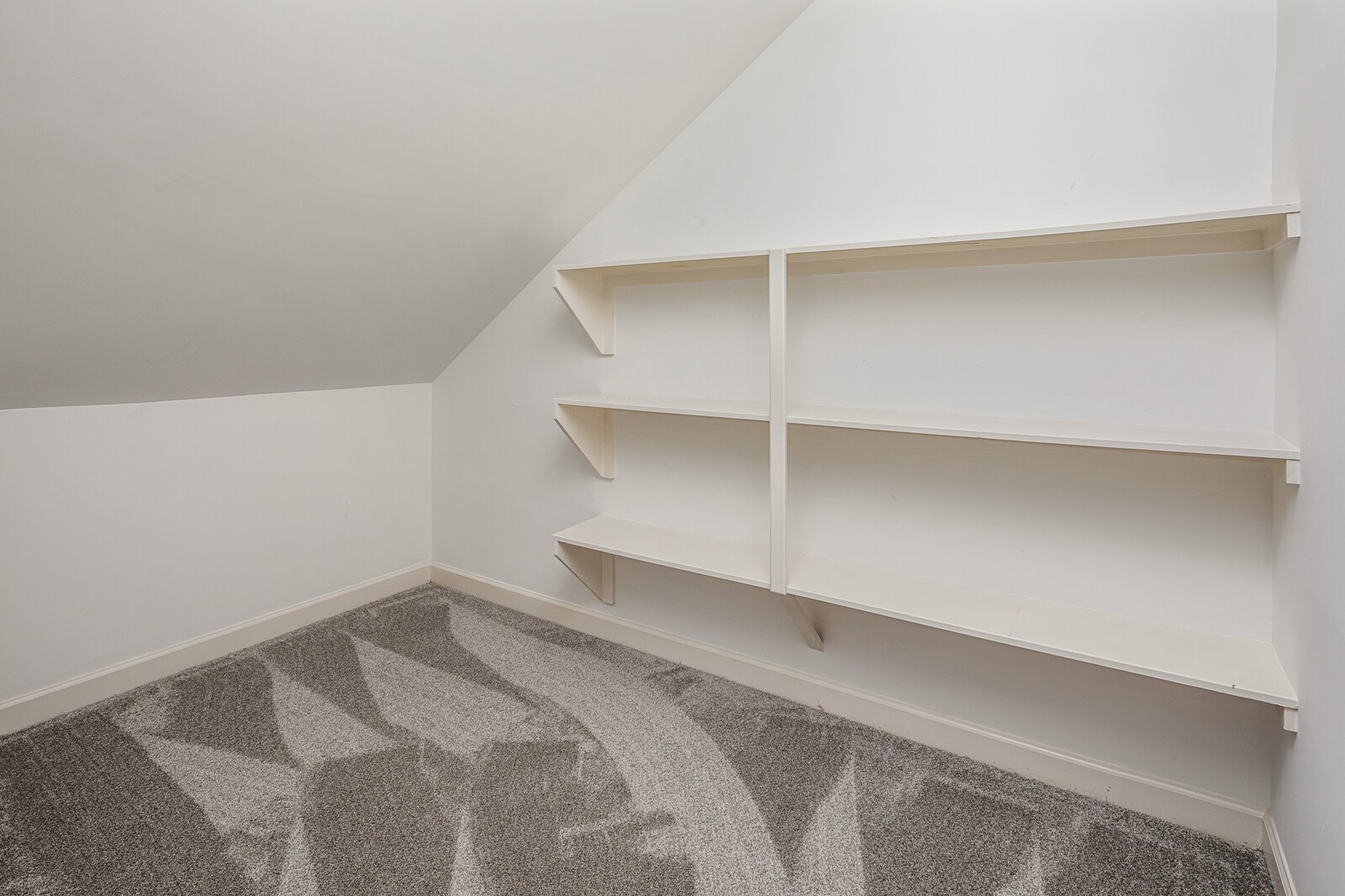 341 Sandcastle Road Franklin, TN 37069 - Photo 31 of 41 a view of a room with a closet and wooden floor