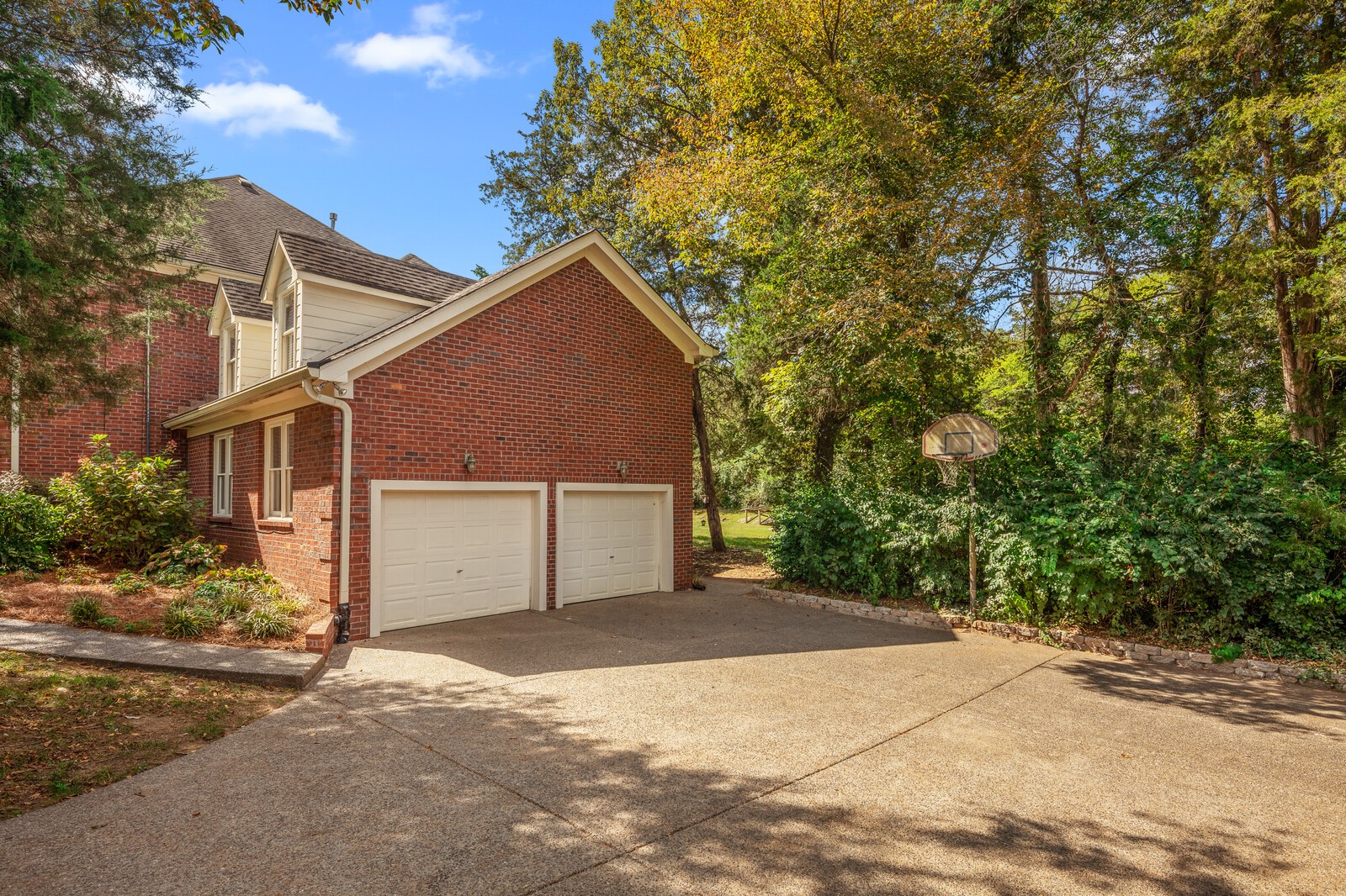 341 Sandcastle Road Franklin, TN 37069 - Photo 34 of 41 a view of a house with a yard and garage
